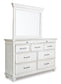 Kanwyn King Panel Bed with Mirrored Dresser, Chest and Nightstand