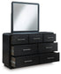 Rowanbeck King Upholstered Panel Bed with Mirrored Dresser