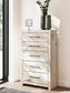 Lawroy King Panel Headboard, Dresser, Mirror, Chest and Nightstand