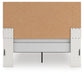 Zuraleus Queen Upholstered Panel Bed, Dresser, Mirror, Chest and Nightstand