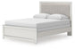 Zuraleus Queen Upholstered Panel Bed, Dresser, Mirror and Nightstand