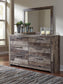 Derekson Queen Panel Bed with 6 Storage Drawers with Mirrored Dresser