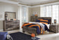 Derekson Full Panel Bed with Mirrored Dresser, Chest and Nightstand