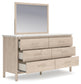 Cadmori Queen Upholstered Panel Bed with Mirrored Dresser and Nightstand