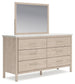 Cadmori Queen Upholstered Panel Bed with Mirrored Dresser
